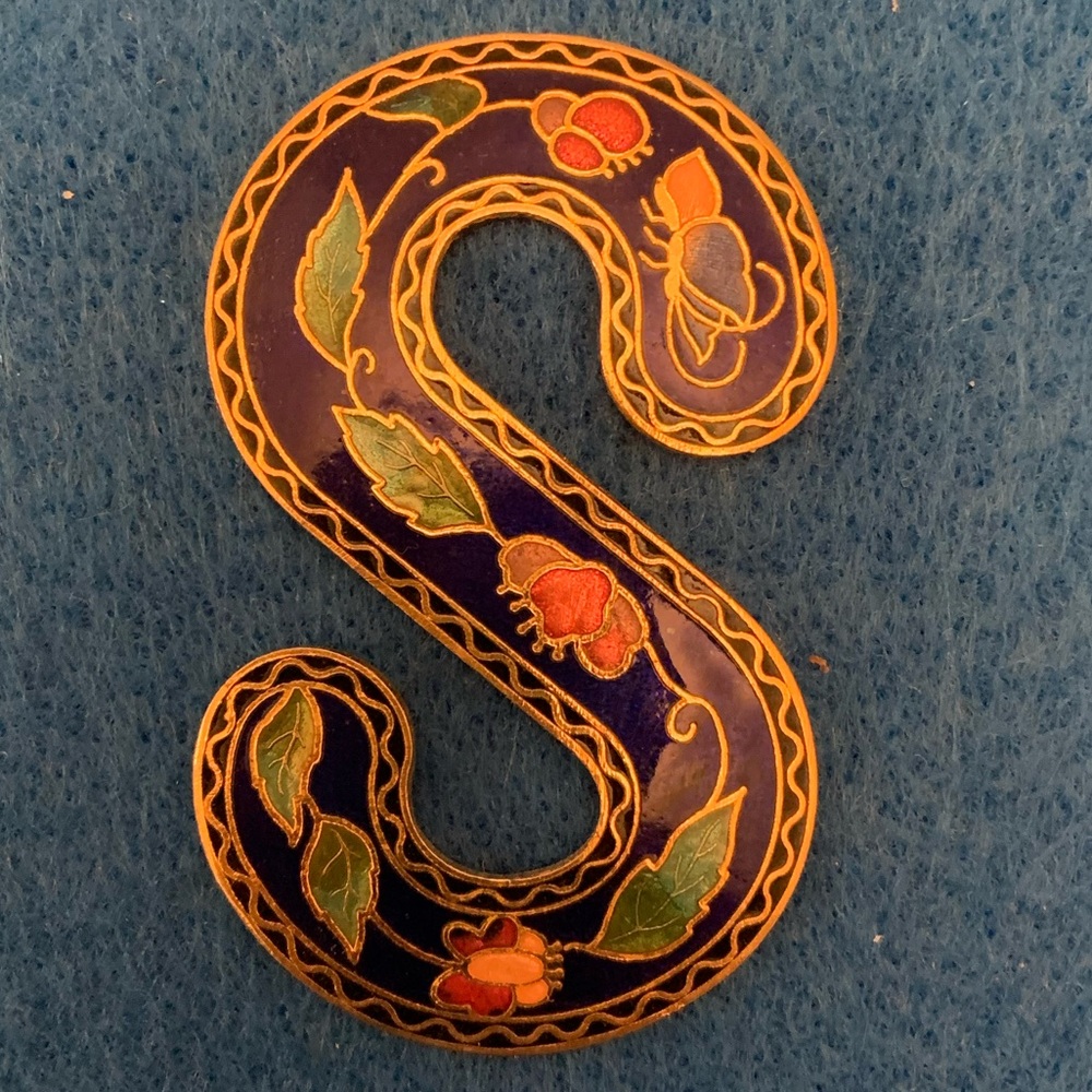 Beautiful cloisonné necklace holder.